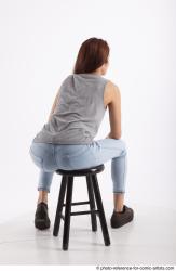 MOLLY SITTING POSE WITH GUN 2